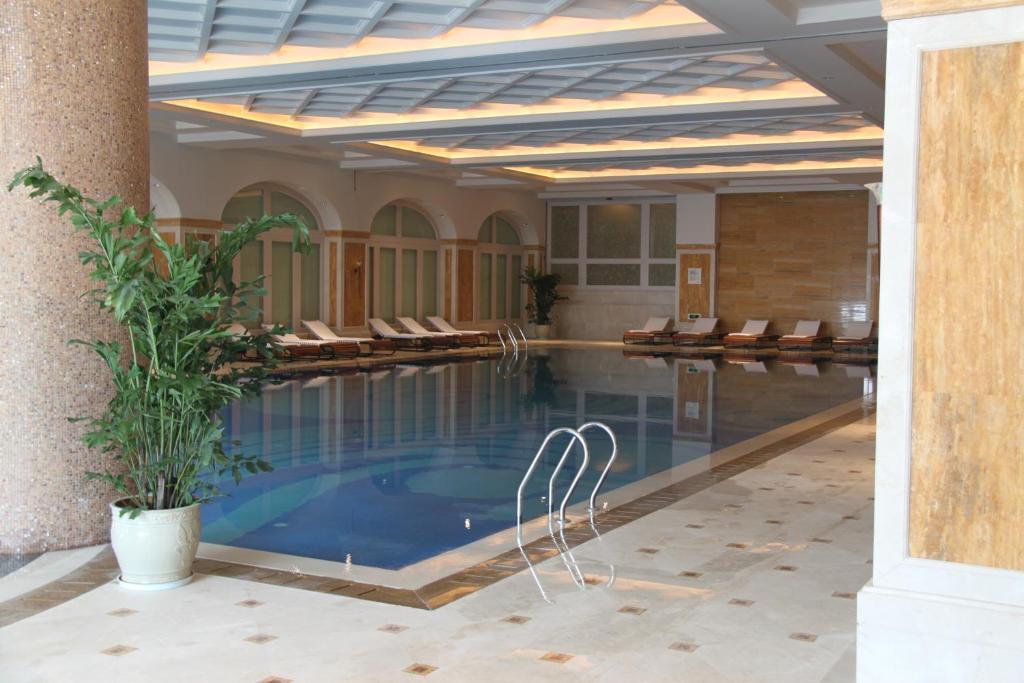 Landison Green Town Hotel Xinchang Luaran gambar